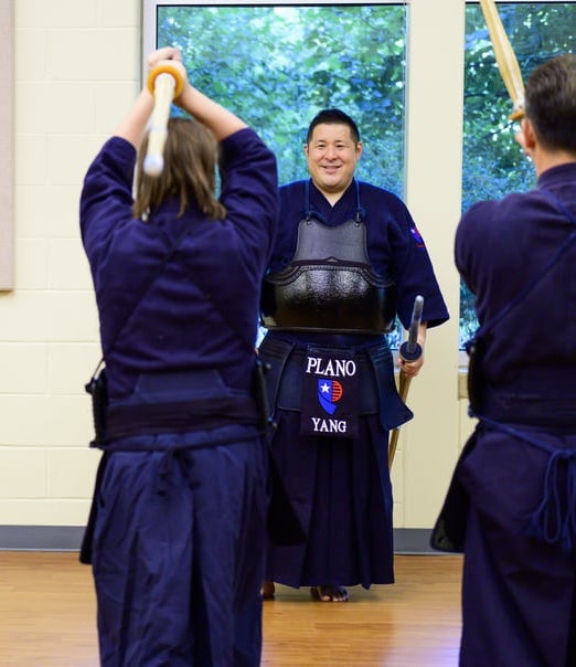 Black and White Picture of Chris Yang in Kendo Gear